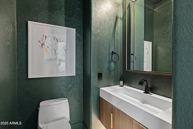 23902 S 202nd Ct, Queen Creek, AZ 85142 - bathroom with toilet, vanity, and wallpapered walls