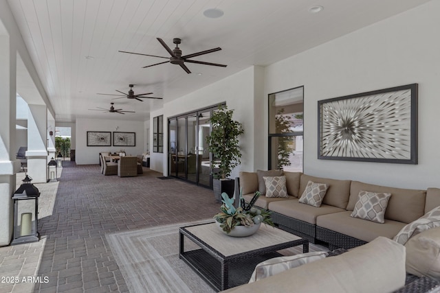 23902 S 202nd Ct, Queen Creek, AZ 85142 - living area with brick floor, french doors, and ceiling fan
