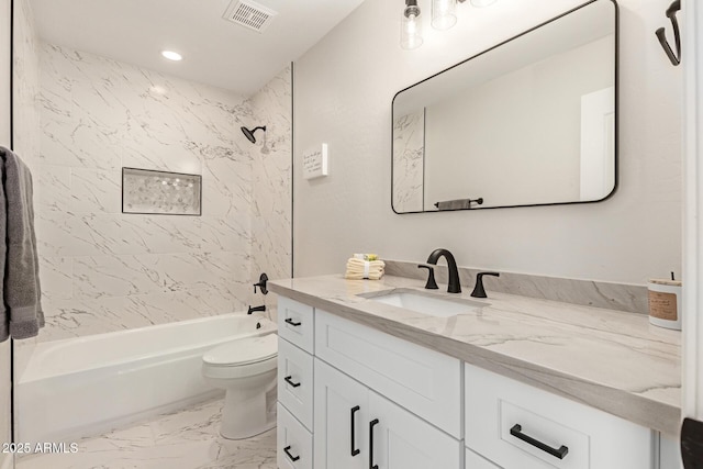 bathroom featuring marble finish floor, bathtub / shower combination, visible vents, toilet, and vanity