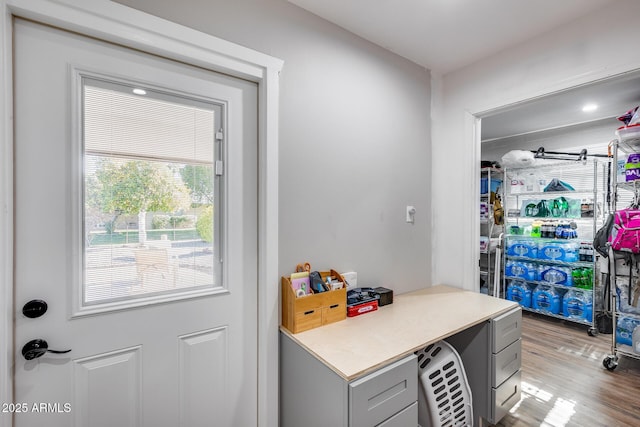 interior space with gray cabinets and light hardwood / wood-style flooring