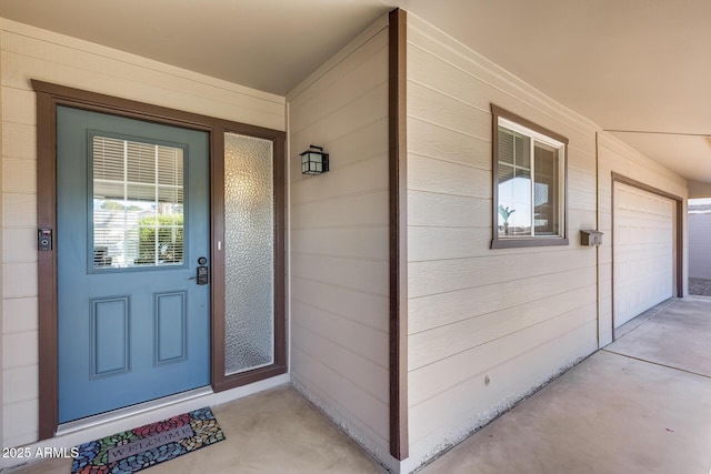 entrance to property with a garage