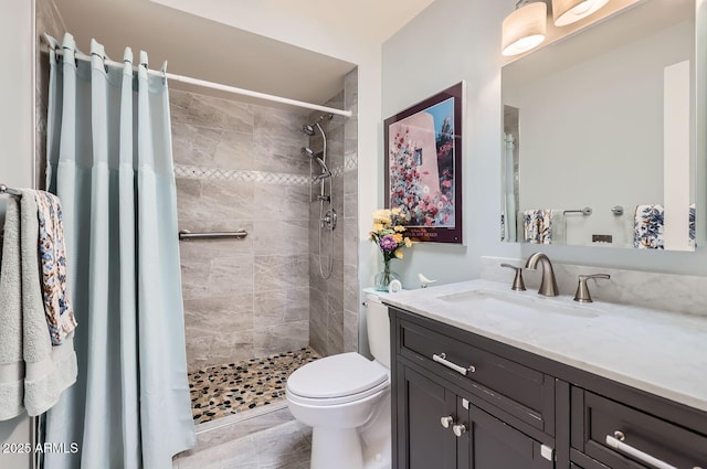 bathroom with vanity, toilet, and a shower with shower curtain