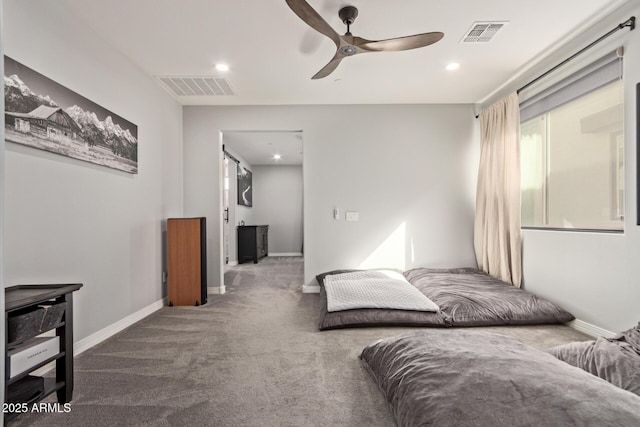 carpeted bedroom with baseboards, visible vents, and recessed lighting