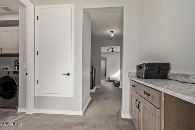 laundry room featuring light carpet, visible vents, cabinet space, and washer / dryer