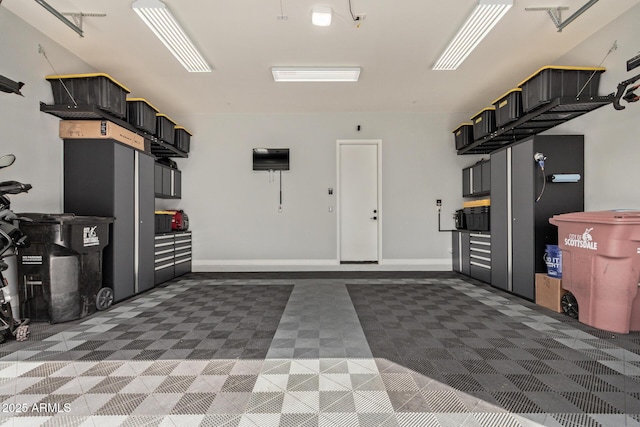 garage with baseboards