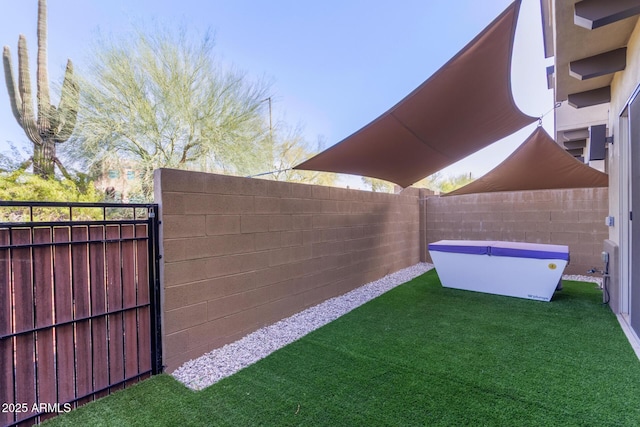 view of yard featuring a fenced backyard