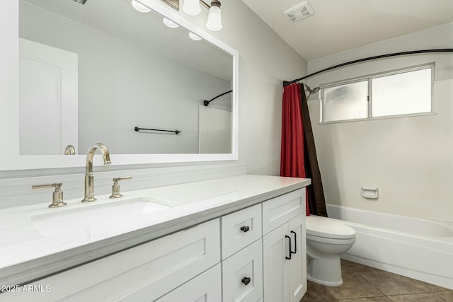 full bathroom featuring shower / tub combo, vanity, toilet, and tile patterned flooring