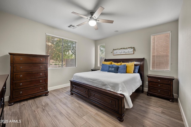 3773 E Stampede Dr, Gilbert, AZ 85297 - bedroom featuring light wood finished floors, baseboards, and ceiling fan