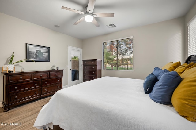 3773 E Stampede Dr, Gilbert, AZ 85297 - bedroom featuring light wood finished floors, a ceiling fan, baseboards, and access to exterior