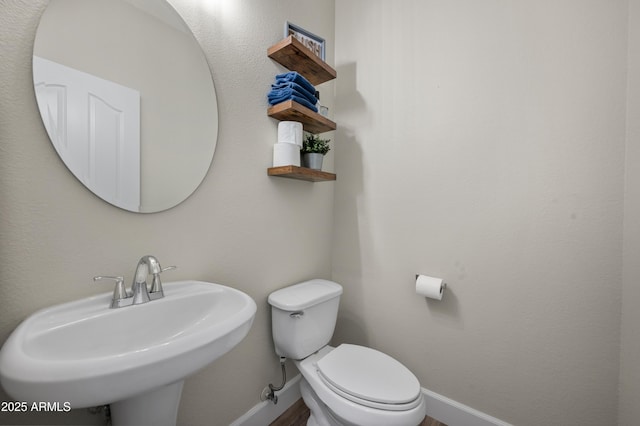 3773 E Stampede Dr, Gilbert, AZ 85297 - bathroom with a sink, baseboards, and toilet