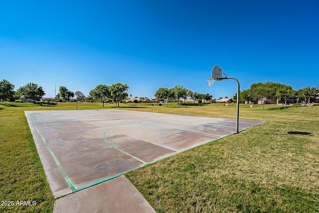 view of sport court with community basketball court and a lawn