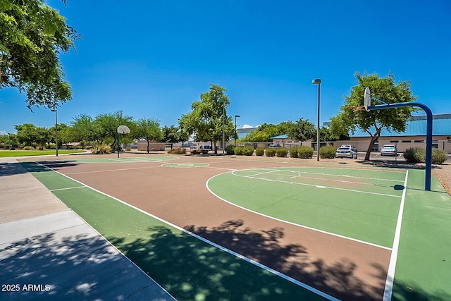 view of sport court featuring community basketball court and fence