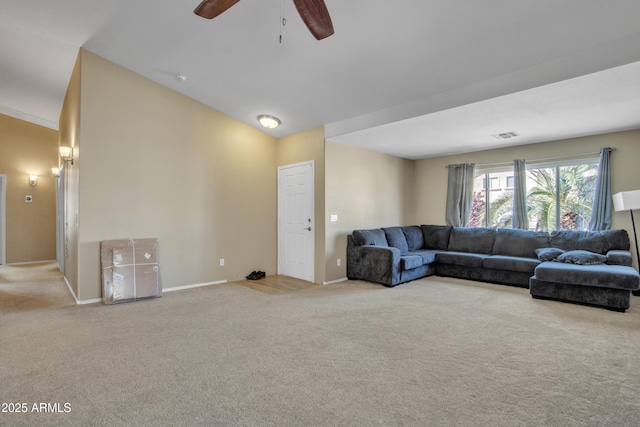 carpeted living room with lofted ceiling, a ceiling fan, and baseboards