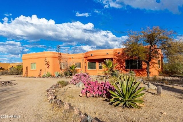 view of pueblo-style home