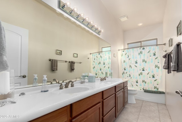 full bathroom with toilet, vanity, tile patterned floors, and shower / bath combo with shower curtain