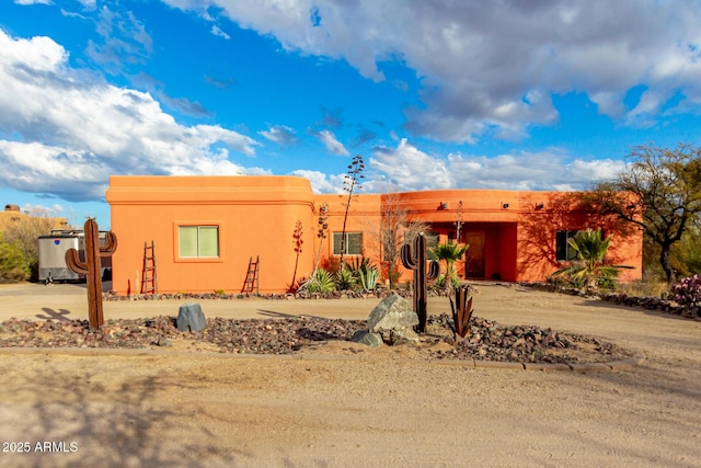 view of pueblo-style home