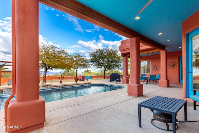 view of pool with a patio