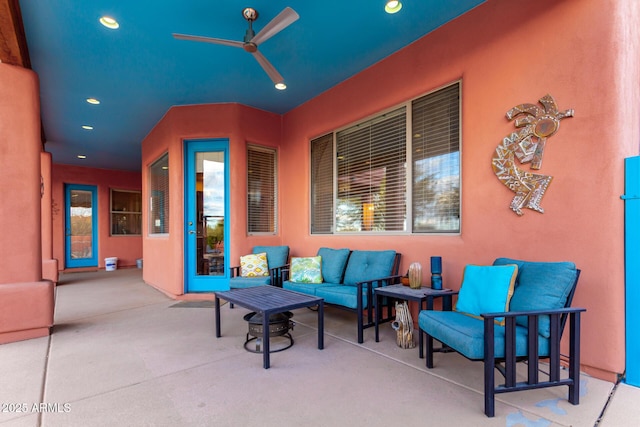 view of patio / terrace with ceiling fan and an outdoor hangout area