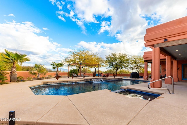 view of swimming pool with a patio area, an in ground hot tub, and pool water feature