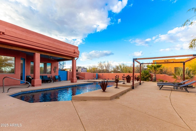 view of pool featuring a patio