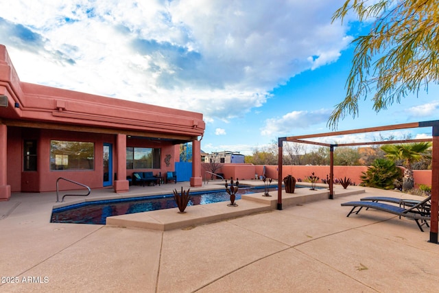 view of swimming pool featuring a patio area and a pergola