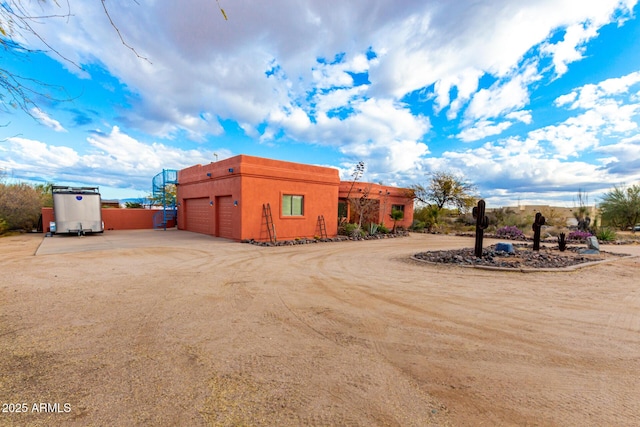 exterior space with a garage