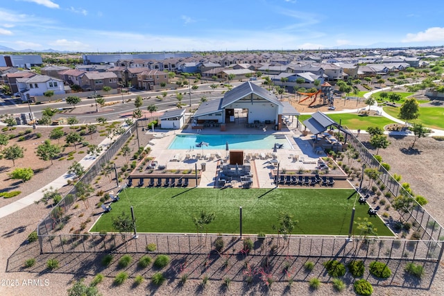 aerial view of residential area with a pool area