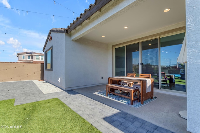 view of patio / terrace with fence