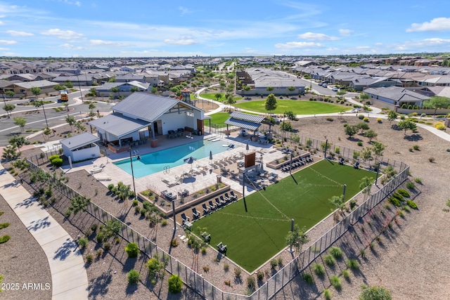 aerial view of residential area with a pool area