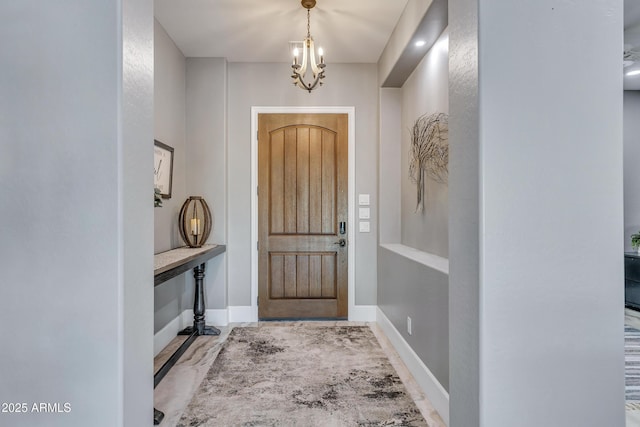 entrance foyer with a notable chandelier