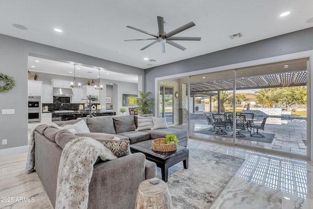 living room featuring ceiling fan