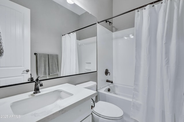 full bathroom with shower / tub combo, vanity, and toilet