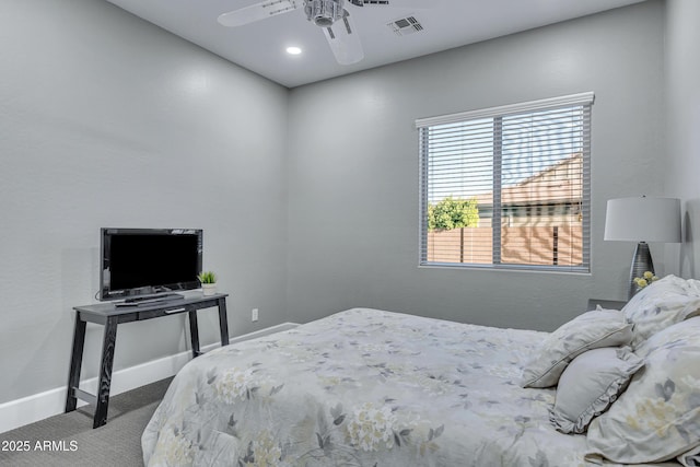 carpeted bedroom with ceiling fan