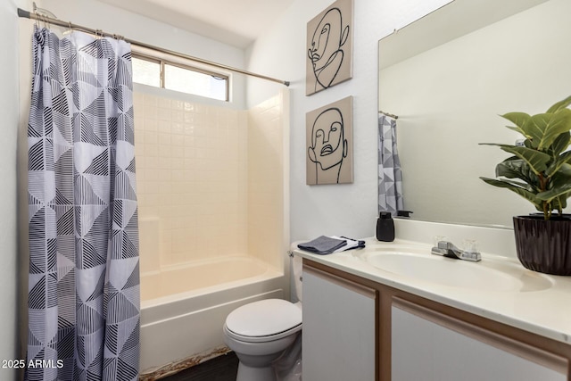 full bath with shower / tub combo, toilet, and vanity