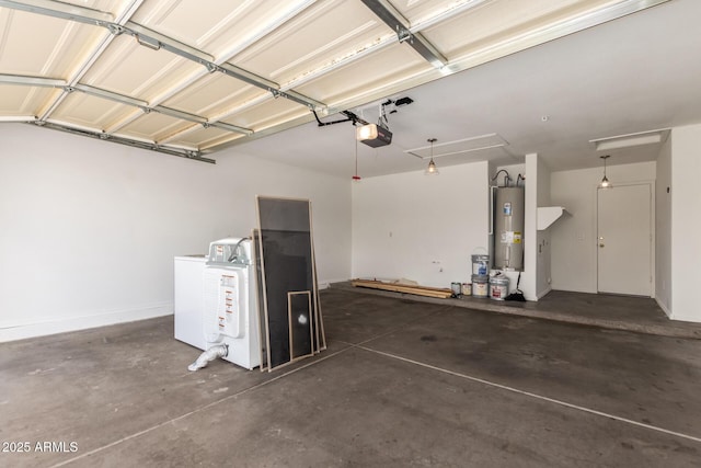garage featuring independent washer and dryer, electric water heater, and a garage door opener