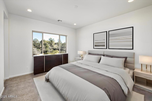 bedroom featuring baseboards, visible vents, recessed lighting, and light colored carpet