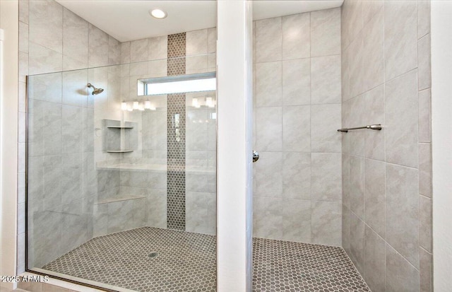 full bath featuring tiled shower