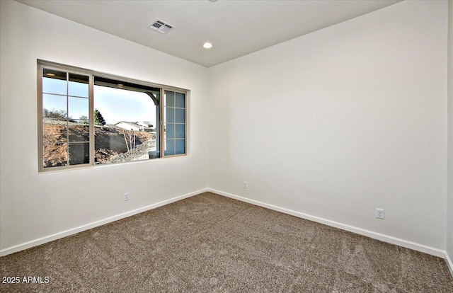 unfurnished room featuring carpet floors, baseboards, recessed lighting, and visible vents