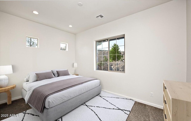 carpeted bedroom with recessed lighting, baseboards, and visible vents