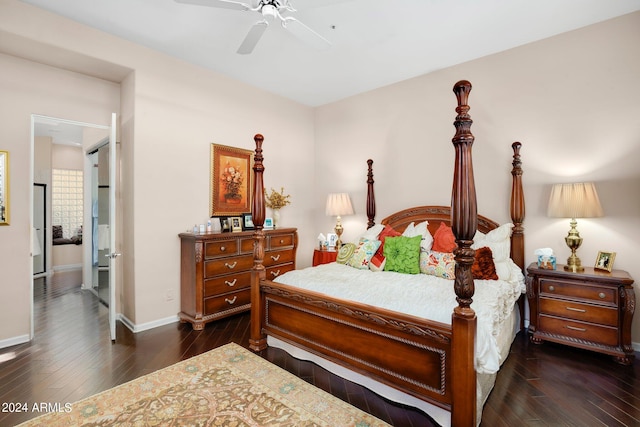 bedroom featuring dark wood-style floors, ceiling fan, and baseboards