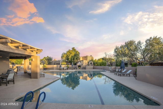 pool with a patio area