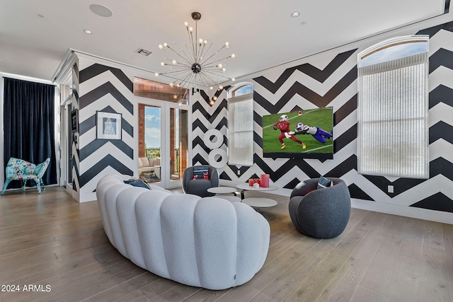 interior space with an inviting chandelier and wood-type flooring