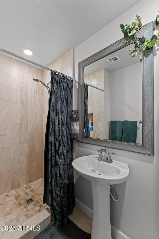 21647 W Laura St, Wittmann, AZ 85361 - bathroom featuring a stall shower