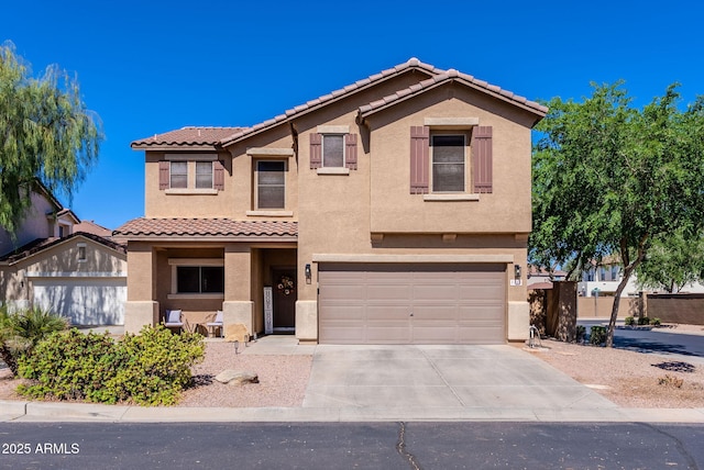 1145 E Lowell Ave, Gilbert, AZ 85295 - view of front of property with stucco siding, concrete driveway, an attached garage, and a tile roof