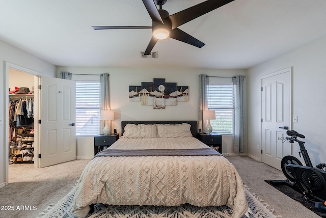 1145 E Lowell Ave, Gilbert, AZ 85295 - bedroom featuring carpet floors, a spacious closet, and baseboards