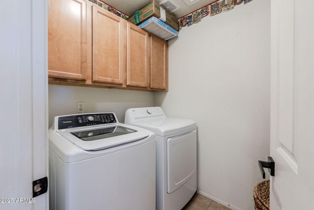 1145 E Lowell Ave, Gilbert, AZ 85295 - washroom with cabinet space, independent washer and dryer, light tile patterned floors, and baseboards