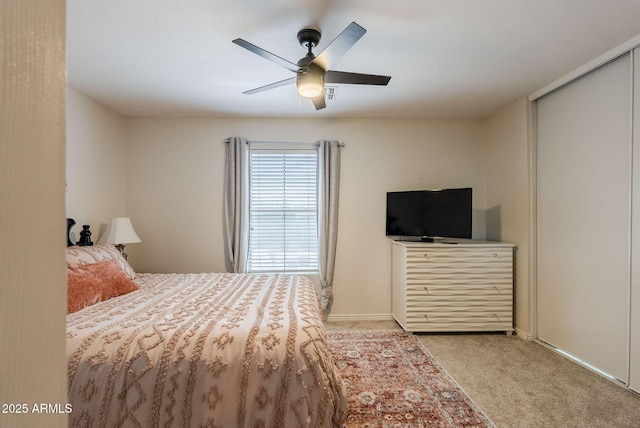 1145 E Lowell Ave, Gilbert, AZ 85295 - bedroom featuring light colored carpet, a ceiling fan, a closet, and baseboards