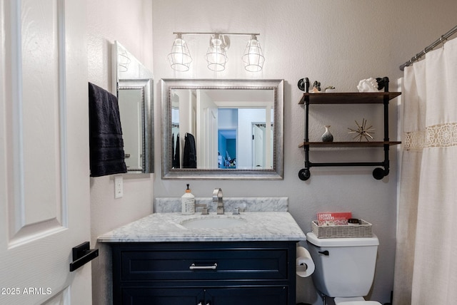 1145 E Lowell Ave, Gilbert, AZ 85295 - bathroom featuring vanity and toilet