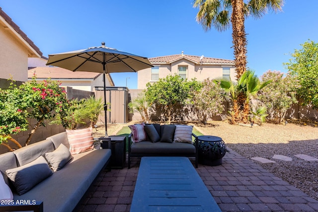 1145 E Lowell Ave, Gilbert, AZ 85295 - fenced backyard featuring an outdoor hangout area and a patio