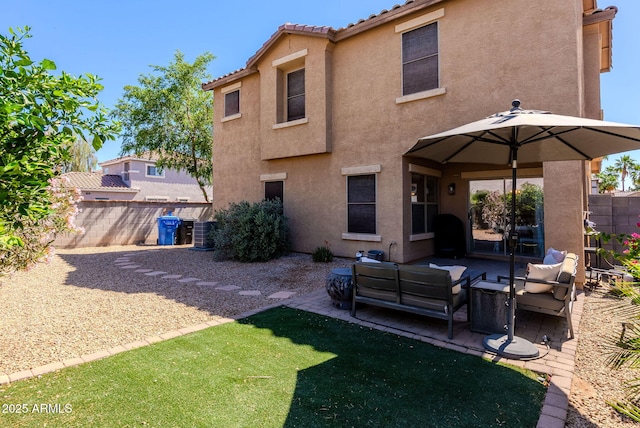 1145 E Lowell Ave, Gilbert, AZ 85295 - back of house with stucco siding, a patio area, an outdoor hangout area, central AC unit, and a tiled roof